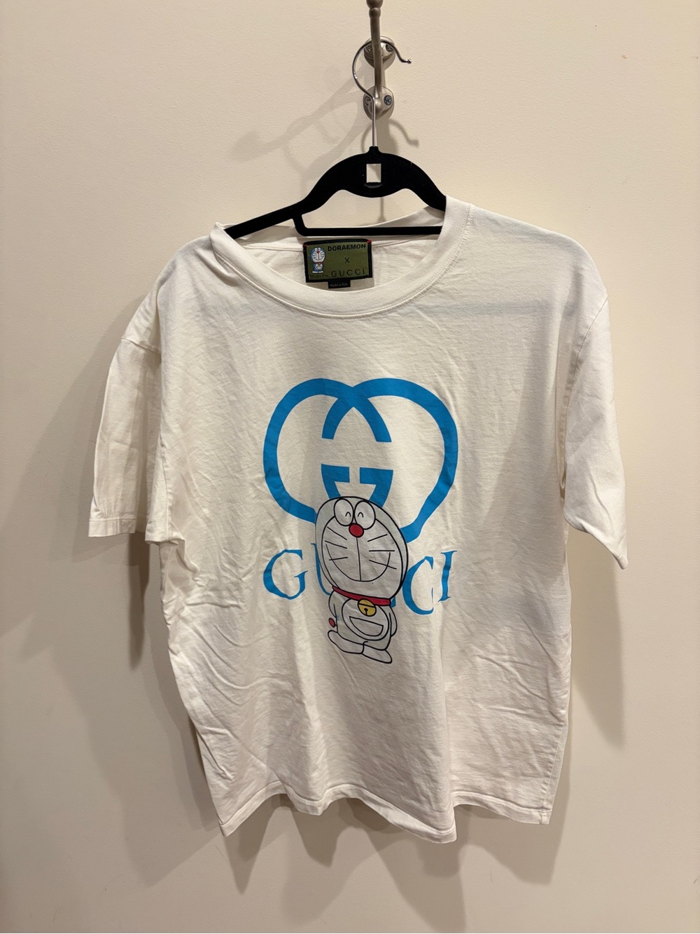 Gucci White Tee with Blue Logo and Doraemon Graphic